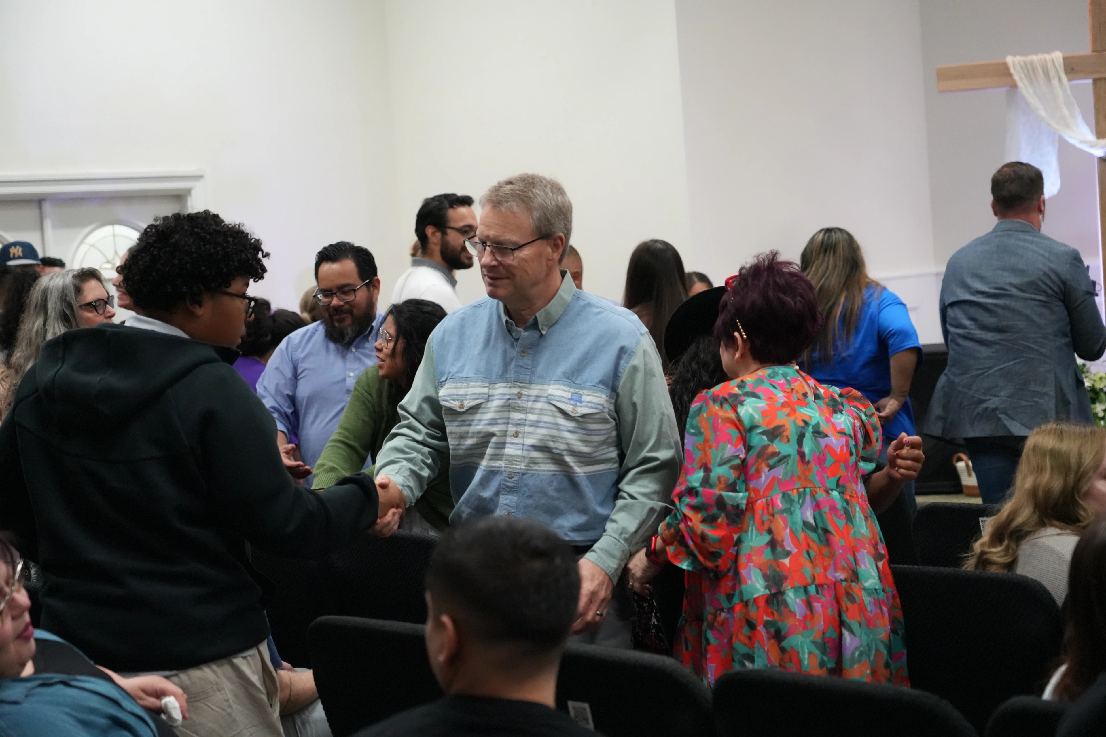 Crowd greeting each other